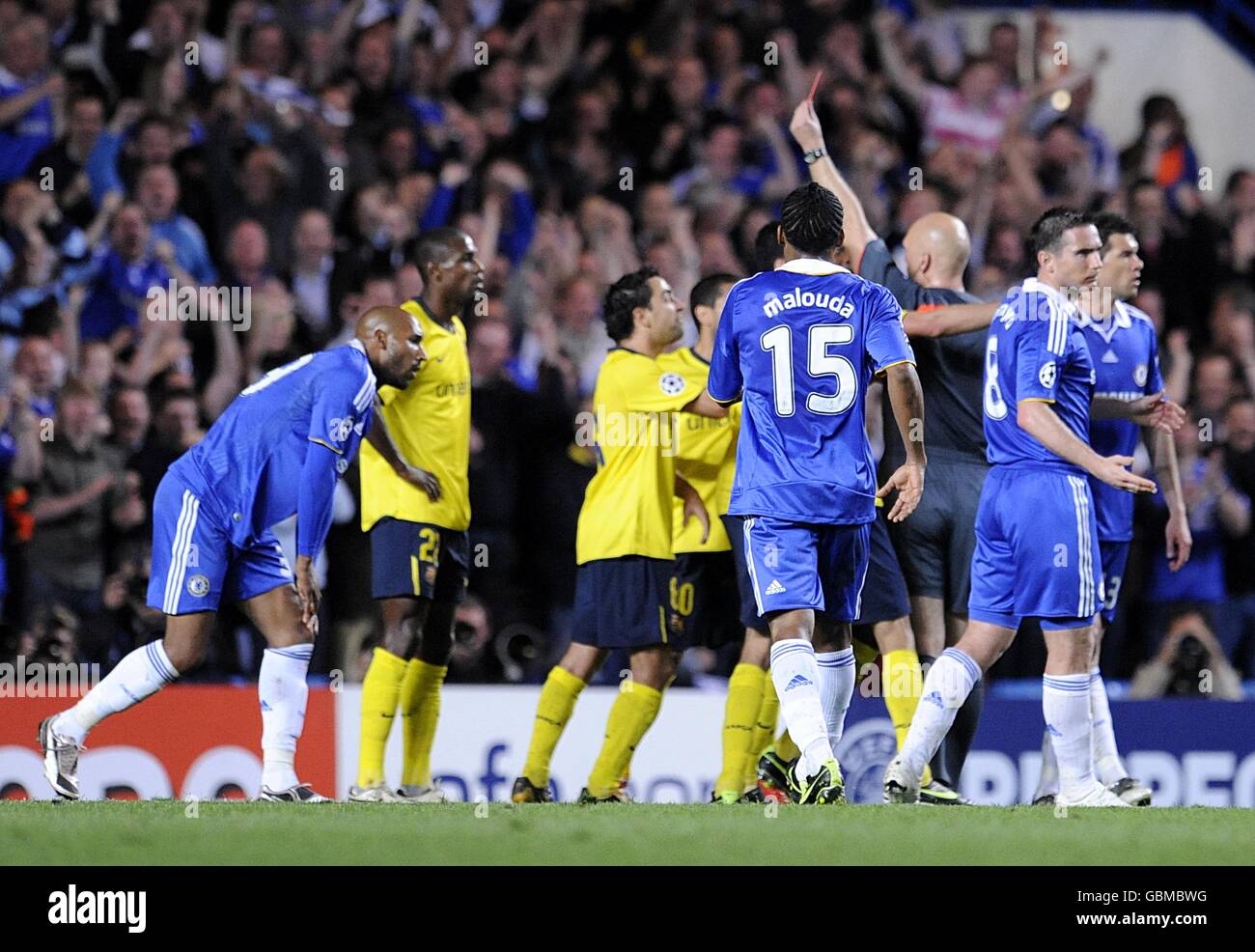 Soccer - UEFA Champions League - Semi Final - Second Leg - Chelsea v Barcelona - Stamford Bridge. Barcelona's Eric Abidal is sent off by referee Tom Ovrebo for a foul on Chelsea's Nicolas Anelka (left) Stock Photo