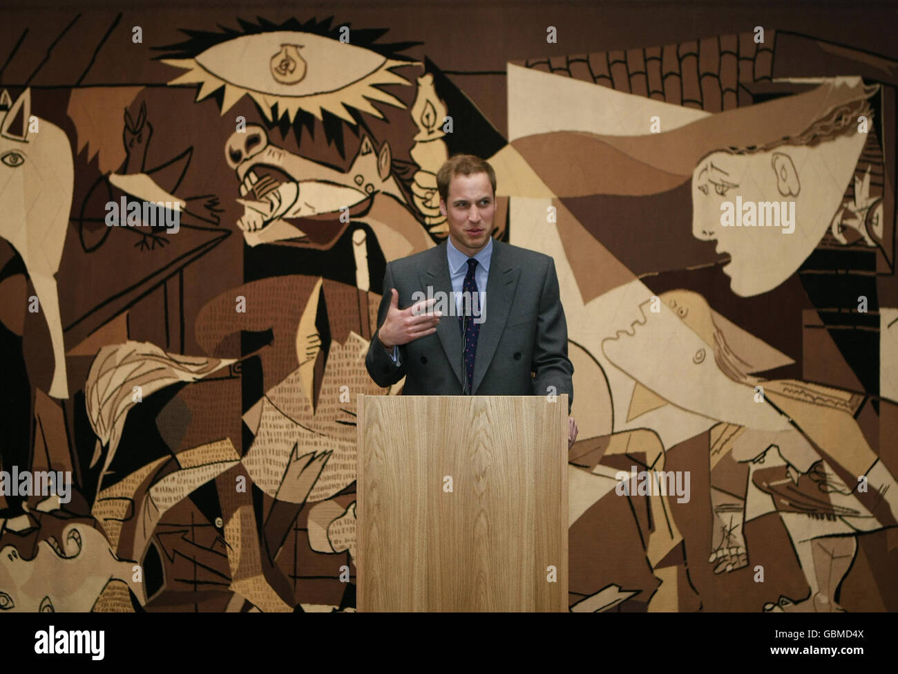 Prince William gives a speech in front of a tapestry of Picasso's Guernica during a tour of the Whitechapel Gallery in London. Stock Photo