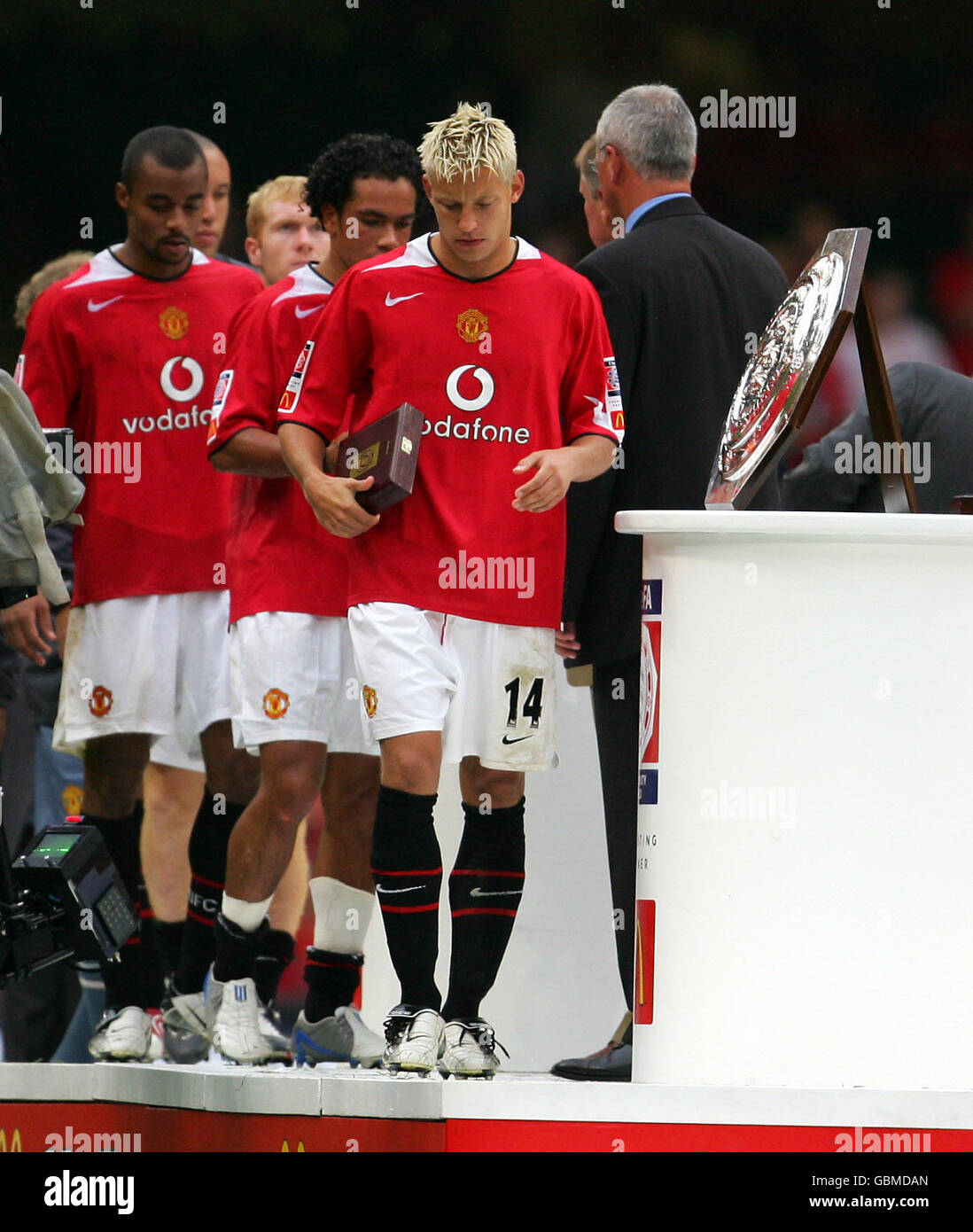 Manchester United's Alan Smith walks away dejected after picking up his losers medal Stock Photo