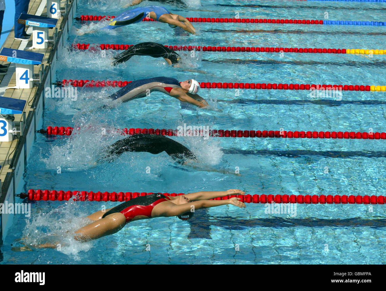 Swimming - Athens Olympic Games 2004 - Women's 100m Backstroke - Heat Six. Natalie Coughlin, USA on her way to winning the Women's 100m Backstroke Stock Photo