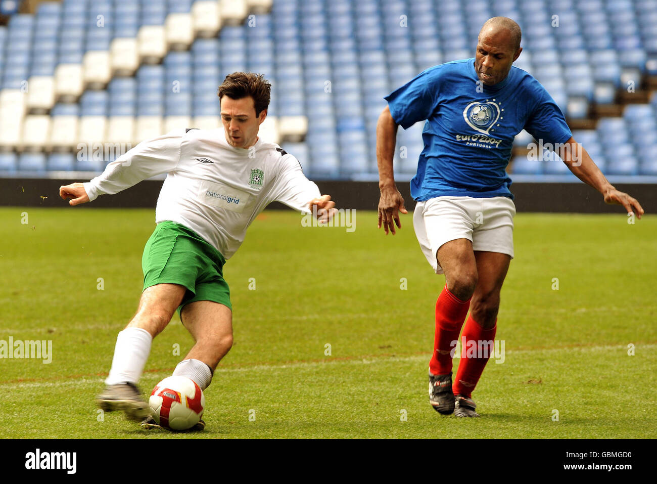 Andy Burnham (left) the Secretary of State for Culture, Media & Sport, in action against ex-pro Luther Blissett for the UK Parliamentary Football team vs. a celebrity sporting team, at Stamford Bridge, this morning. Stock Photo