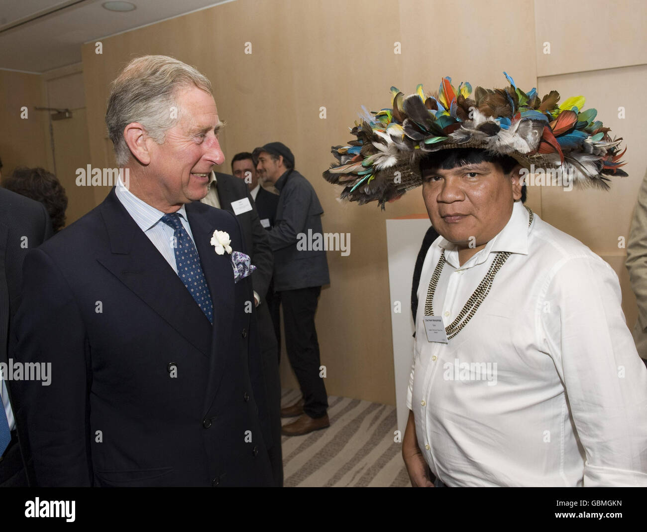 The Prince of Wales meets Amazonian tribal leader Chief Almir Narayamoga Surui, from the Surui tribe at Google's annual European Zeitgeist gathering in Hertfordshire. Stock Photo