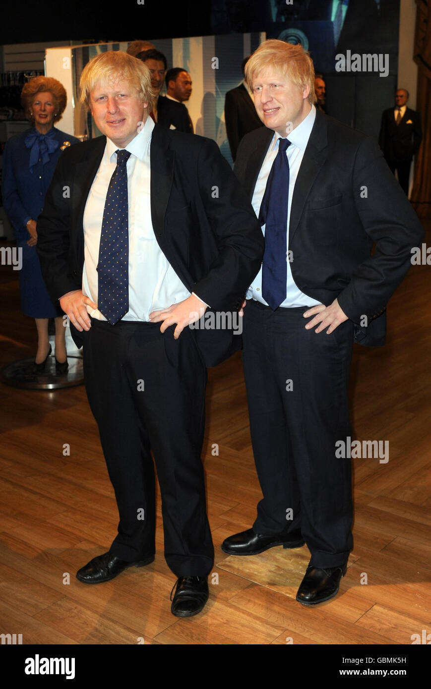 Mayor of London, Boris Johnson (left), meets his wax figure at Madame Tussauds in central London. Stock Photo