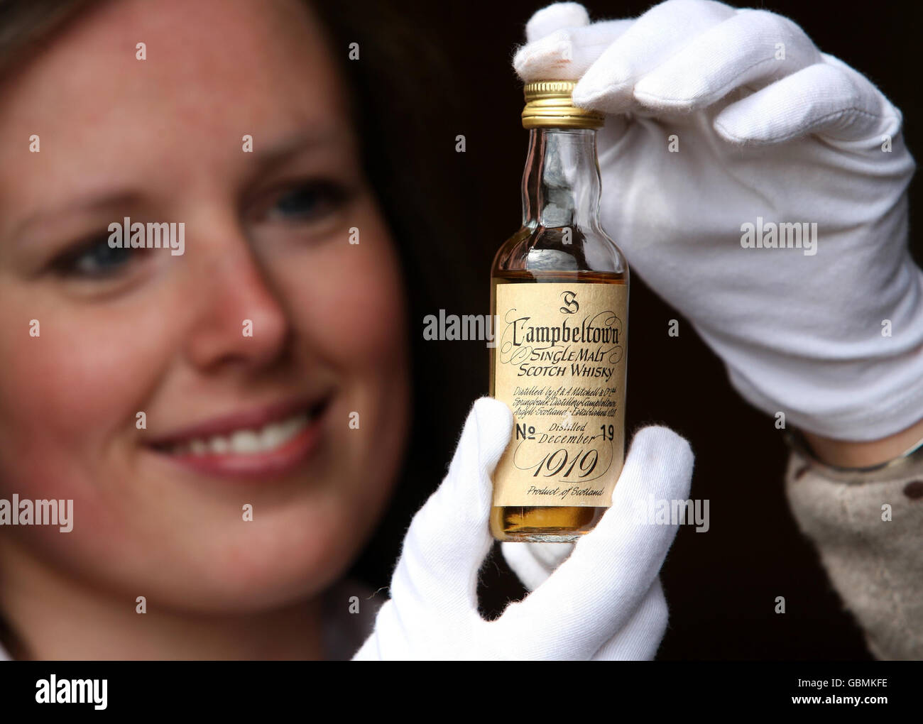 Valuer Magda Ketterer from McTears Auctioneers with a rare Springbank