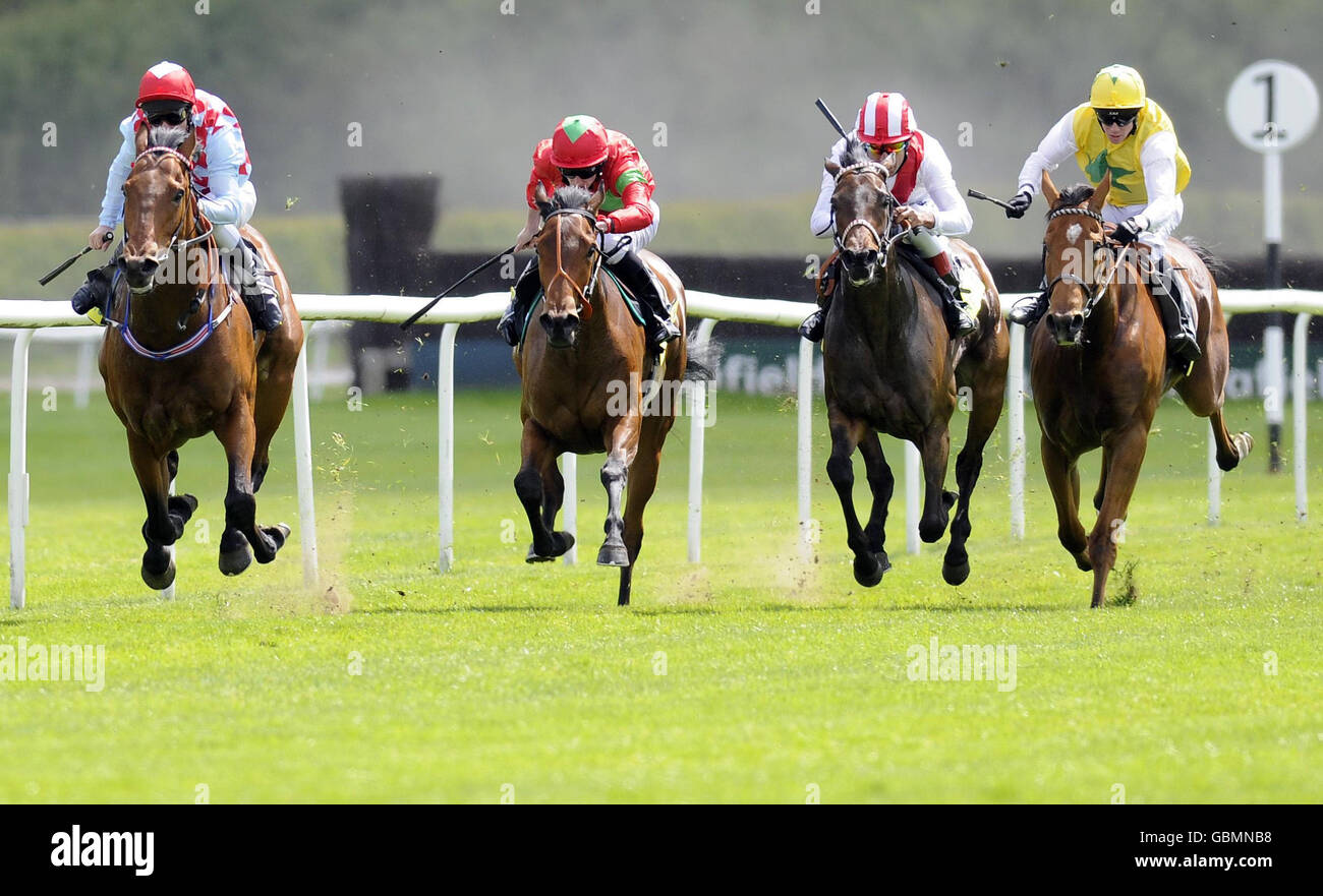 Seek N' Destroy and Michael Hills (left) go on to win The totesportgames.com Handicap Stakes at Lingfield Park Racecourse. Stock Photo