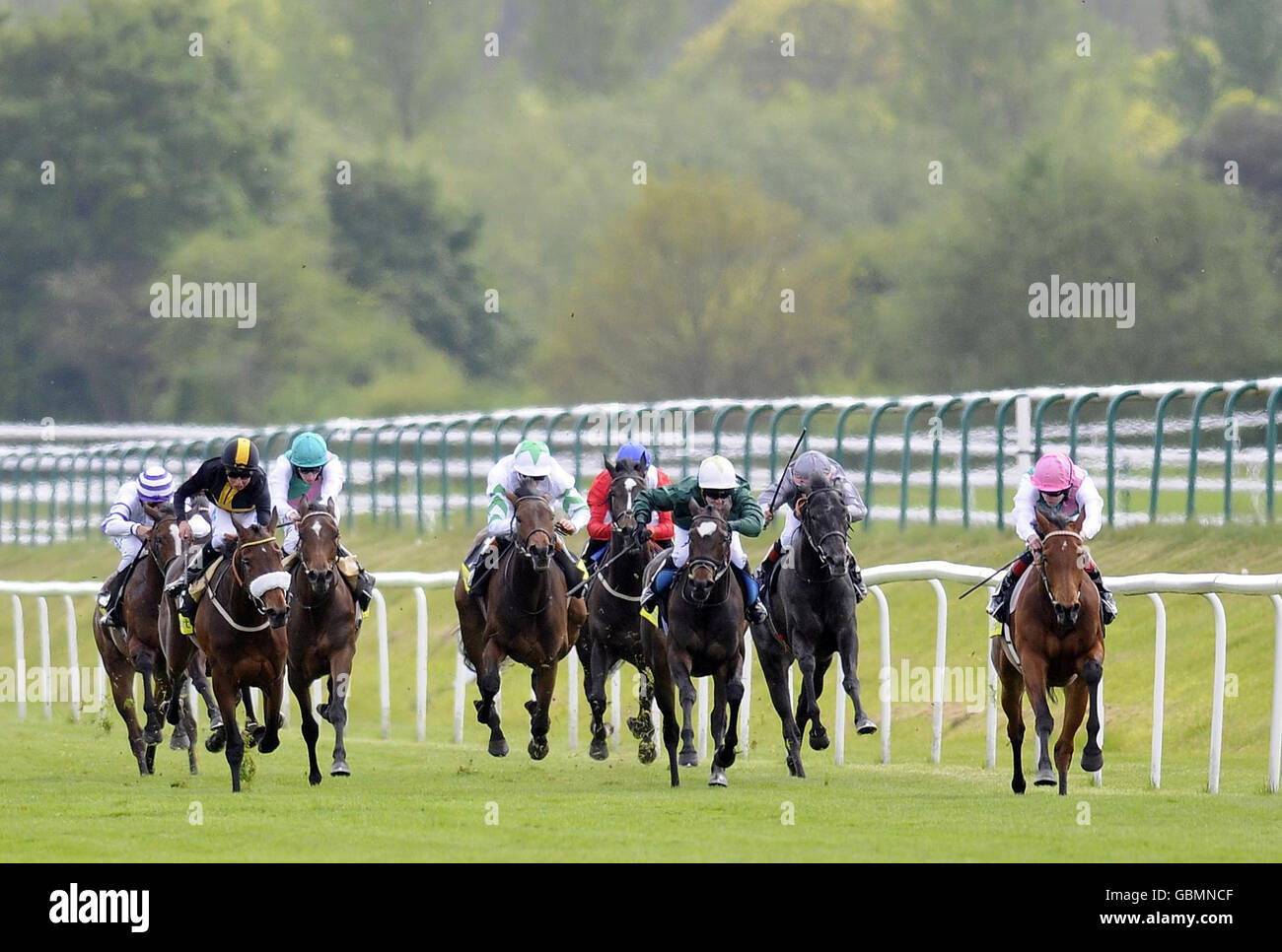Midday and Tom Queally (right) goes on to win The totesportcasino.com Oaks Trial Stakes at Lingfield Park Racecourse. Stock Photo