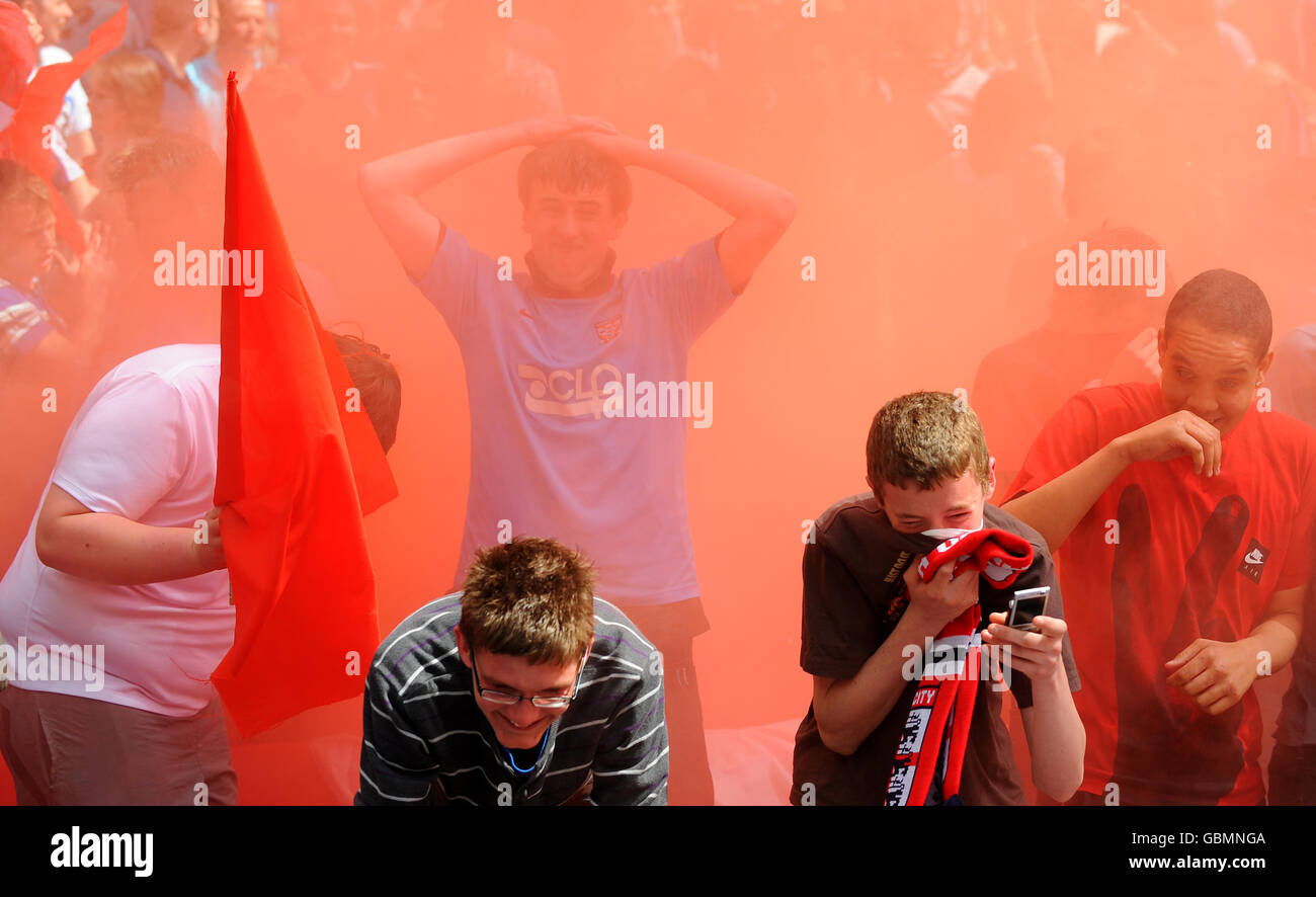York City fans are engulfed in smoke after fans set off smoke bombs and