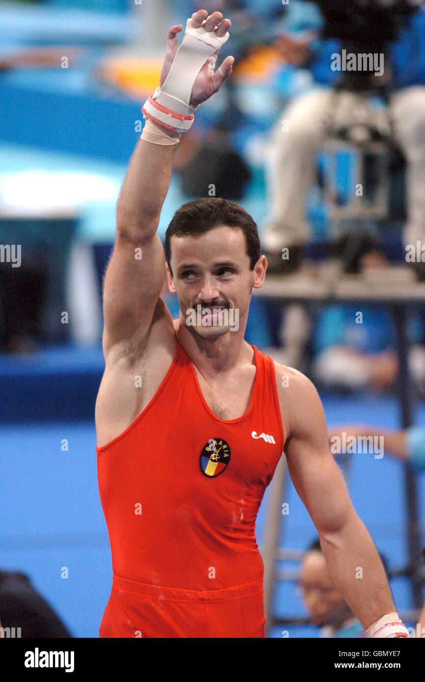 Romanias marius daniel urzica celebrates aftert the horizontal bar hi