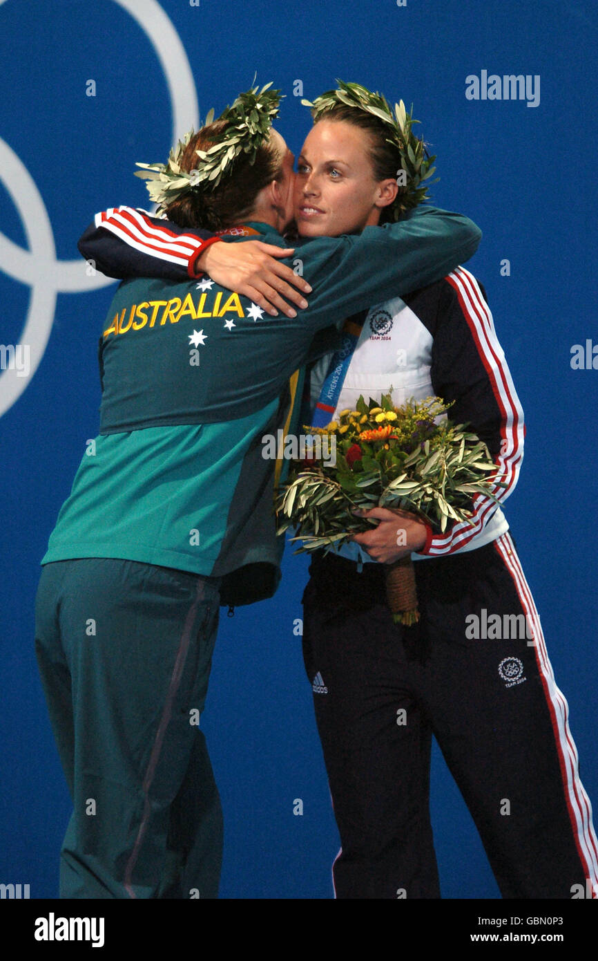 Australia's Leisel Jones (l) and USA's Amanda Beard congratulate eachother after receiving their medals Stock Photo