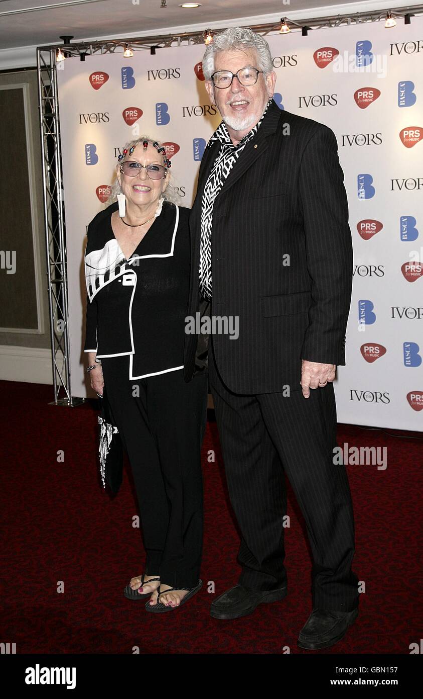 Rolf Harris and wife Alwen Hughes arrive at the 54th Ivor Novello Awards at the Grosvenor House, Park Lane London. Stock Photo