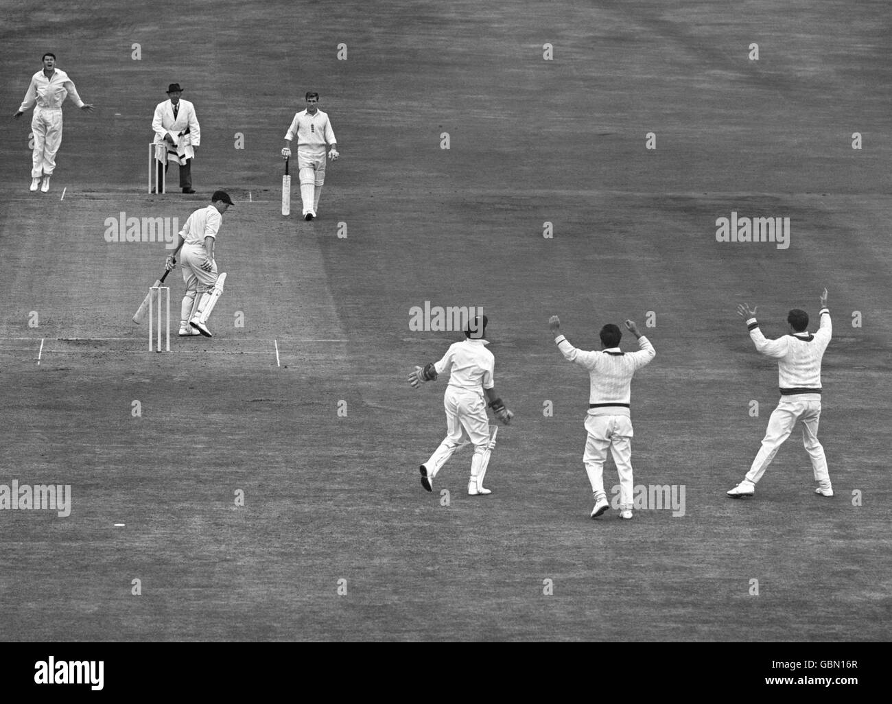 Cricket - Third Test Match - England v Australia - Headingley - Day One. England batsman Ken Taylor is caught out by wicket keeper Wally Grout off Neil Hawke for 9 runs. Stock Photo