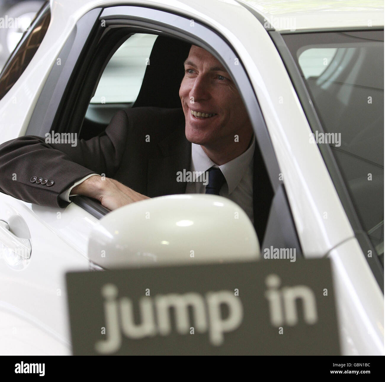 Jim Murphy visits car dealership Stock Photo