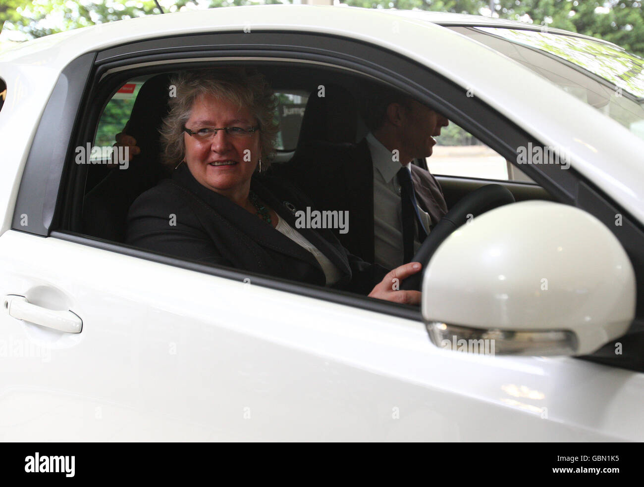 Stirling MP Anne McGuire sits in a Toyota IQ whilst visiting Toyota Arnold Clark car dealership to hear about effect of Government car-scrappage scheme . Stock Photo