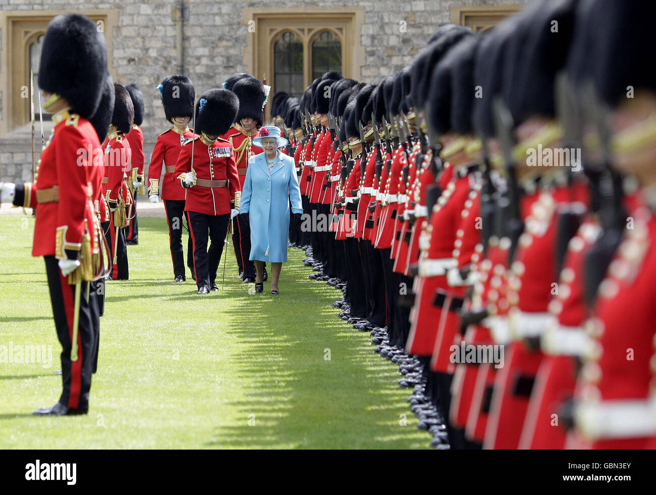 Queen Elizabeth II accompanied by the Duke of Edinburgh after presenting new colours to the 1st Battalion Irish Guards at Windsor Castle, Berkshire. Stock Photo