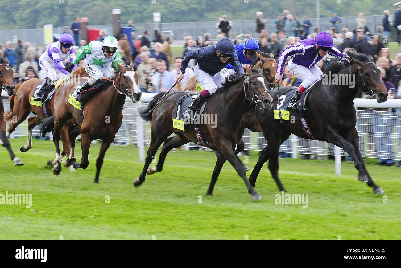 Colm O'Donoghue and Black Bear Island (number 1) beat stablemate Freemantle and Johnny Murtagh (right) to win the Totesport.com Dante Stakes at York Racecourse. Stock Photo