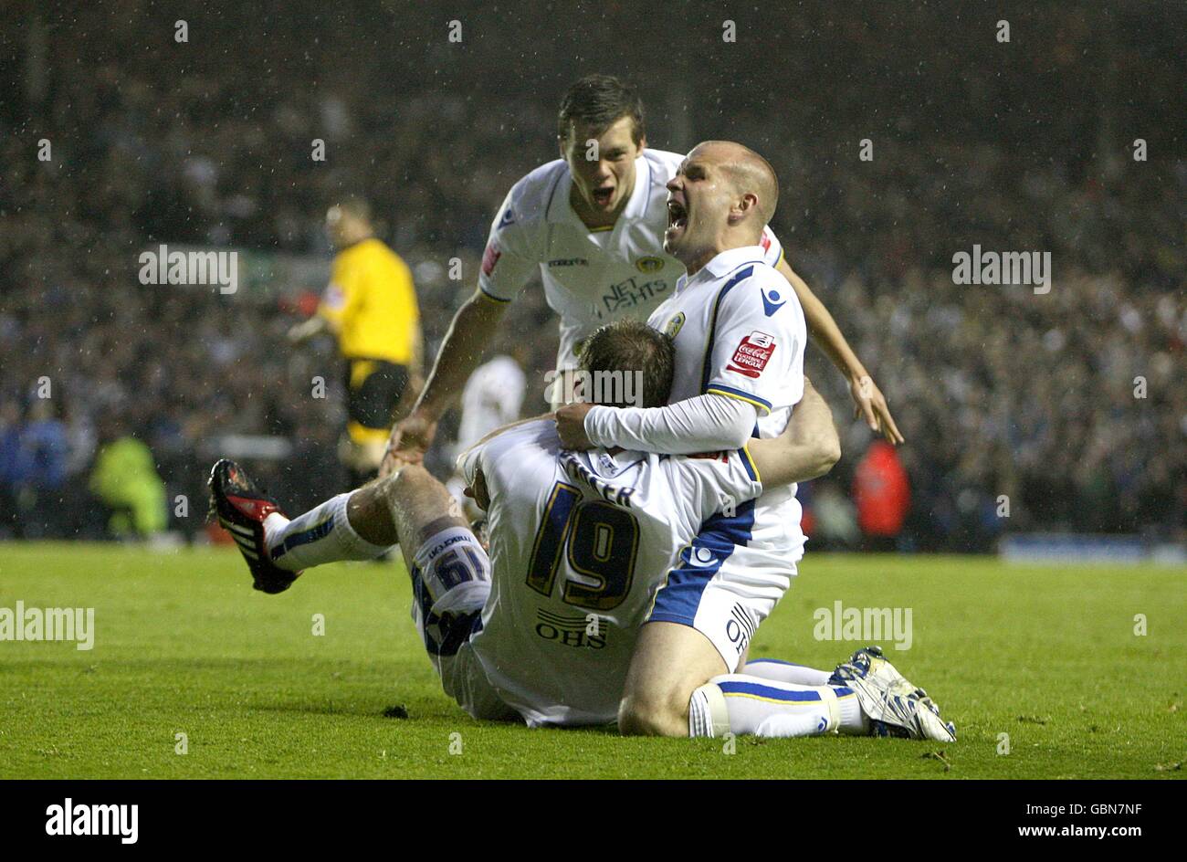 Leeds United's Ben Parker (left), Andy Robinson (right) and Jonathan Howson (centre) celebrtae after team mate Luciano Becchio (out of picture) scores the first goal Stock Photo