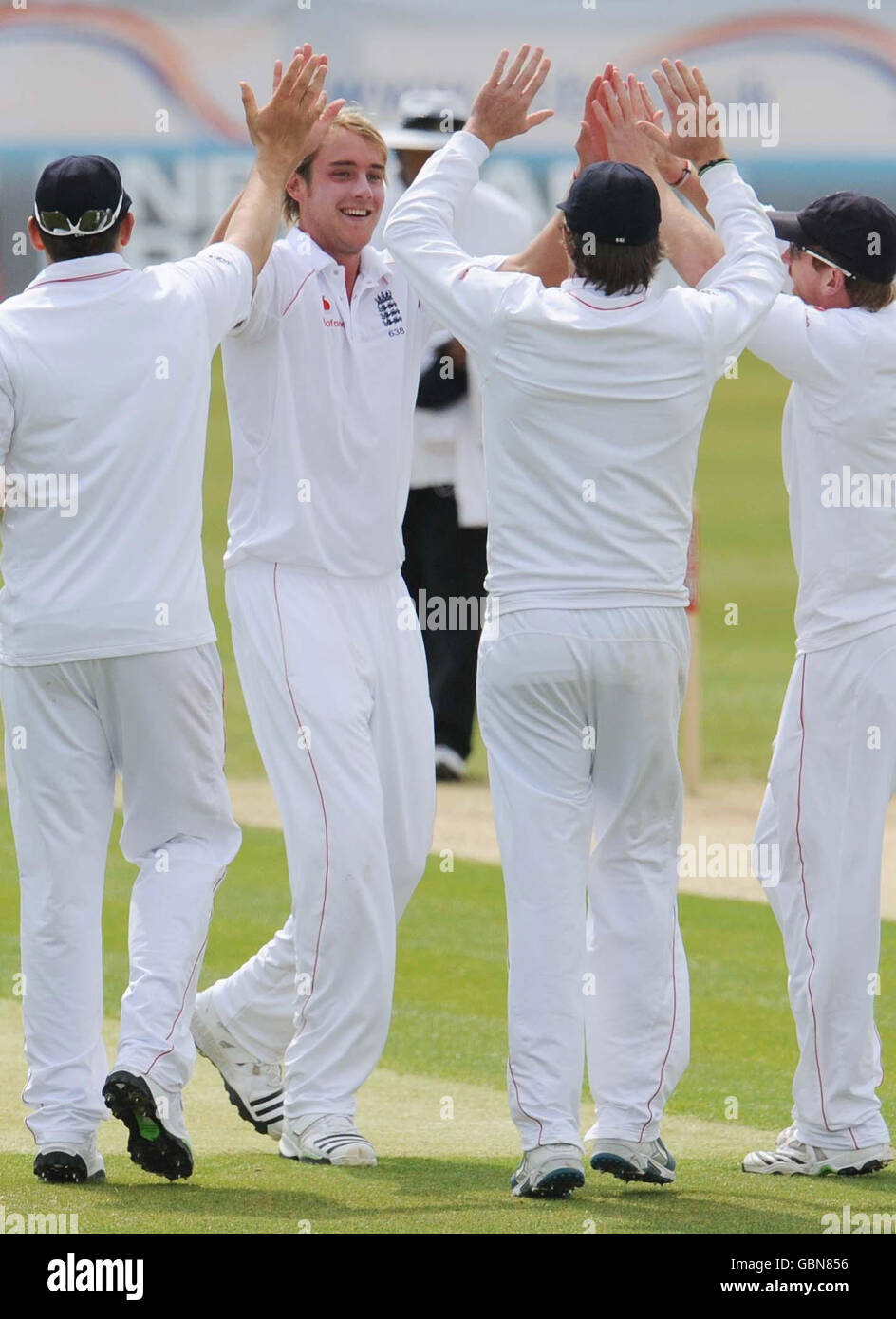 England's Stuart Broad (facing) celebrates his wicket of West Indies' Shivnarine Chanderpaul with teammates during the Second npower Test Match at the Riverside, Chester-Le-Street, Durham. Stock Photo