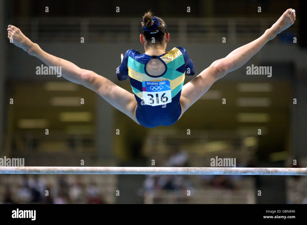 Gymnastics - Athens Olympic Games 2004 - Uneven Bars. Brazil's Lais Souza on the uneven bars Stock Photo
