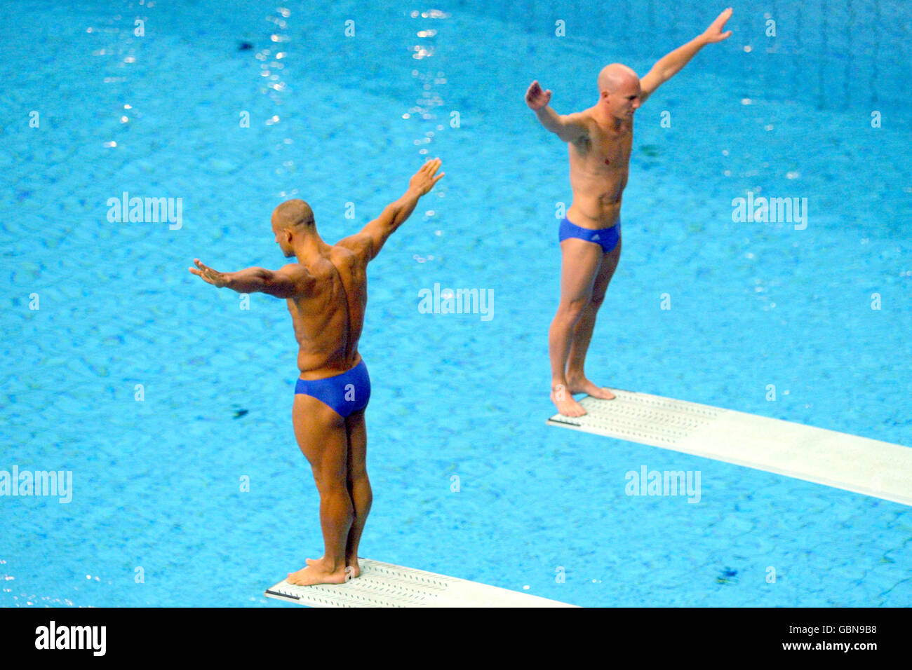 Diving - Athens Olympic Games 2004 - Men's Synchronised Springboard - Final. Great Britain's Tony Ally and Mark Shipman in action Stock Photo