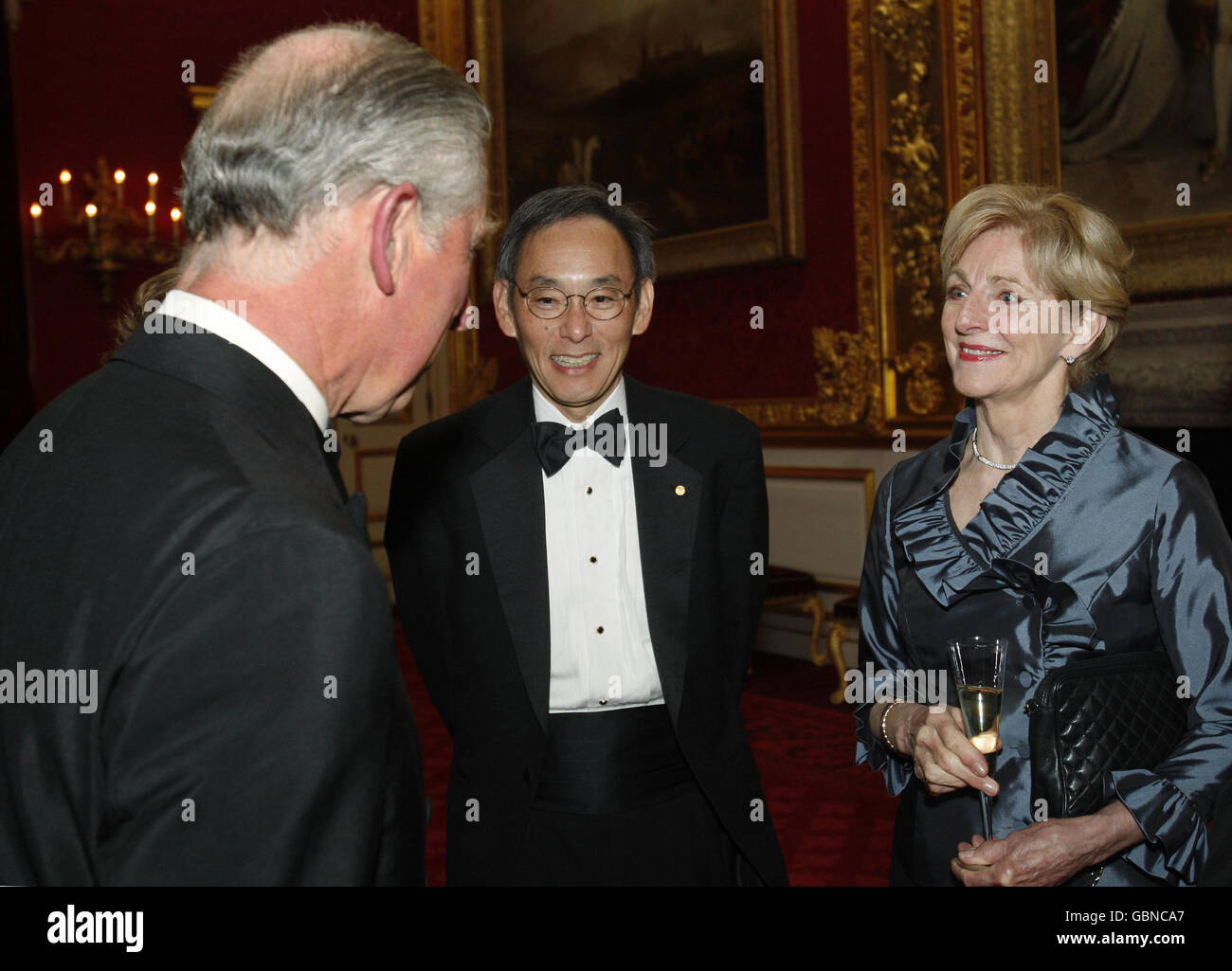 Britain's Prince Charles, the Prince of Wales (left) talks to unidentified guests, during a reception for Nobel Laureates and climate change experts, at St James's Palace in London, Stock Photo