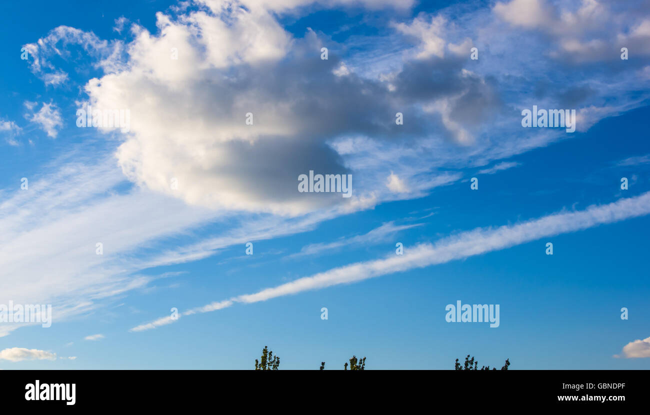 White clouds in the blue summer sky Stock Photo - Alamy
