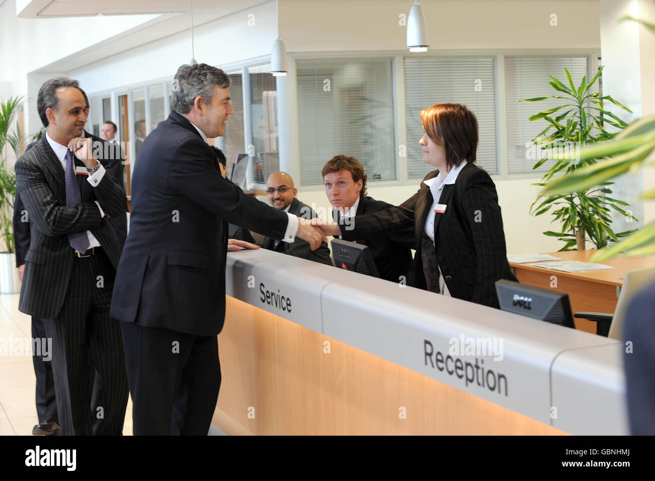 Prime Minister Gordon Brown meets staff at the Alan Day Nissan car