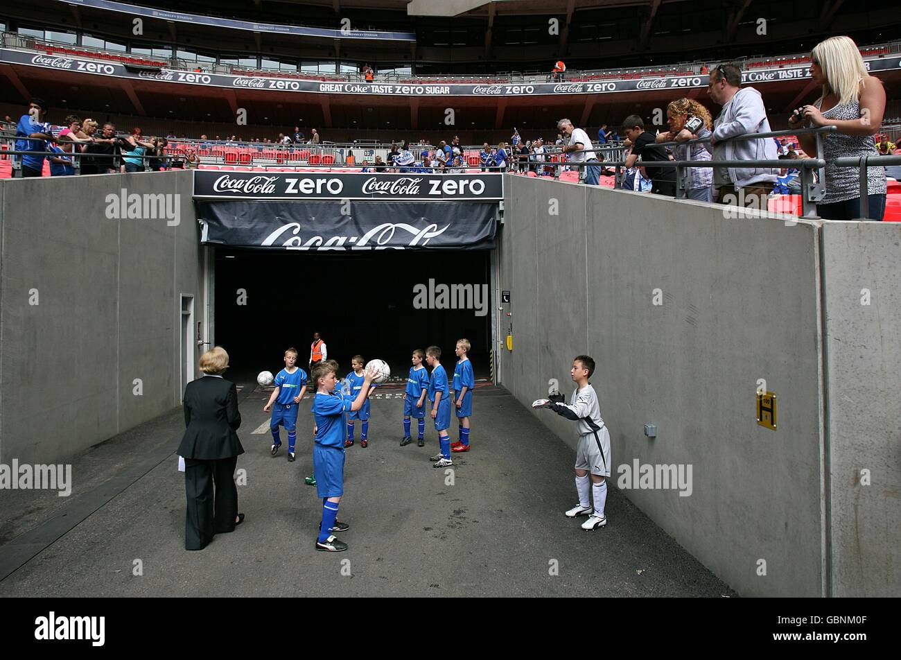 Soccer - Coca-Cola Football League Two - Play Off - Final - Gillingham v Shrewsbury Town - Wembley Stadium. Teams makes their way out of the tunnel prior to the Community Cup, before the match Stock Photo