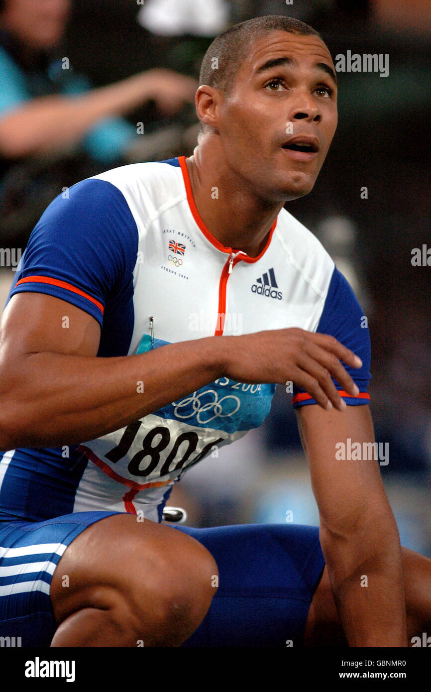 Great Britain's Jason Gardner disappointedly looks to the scoredboard ...