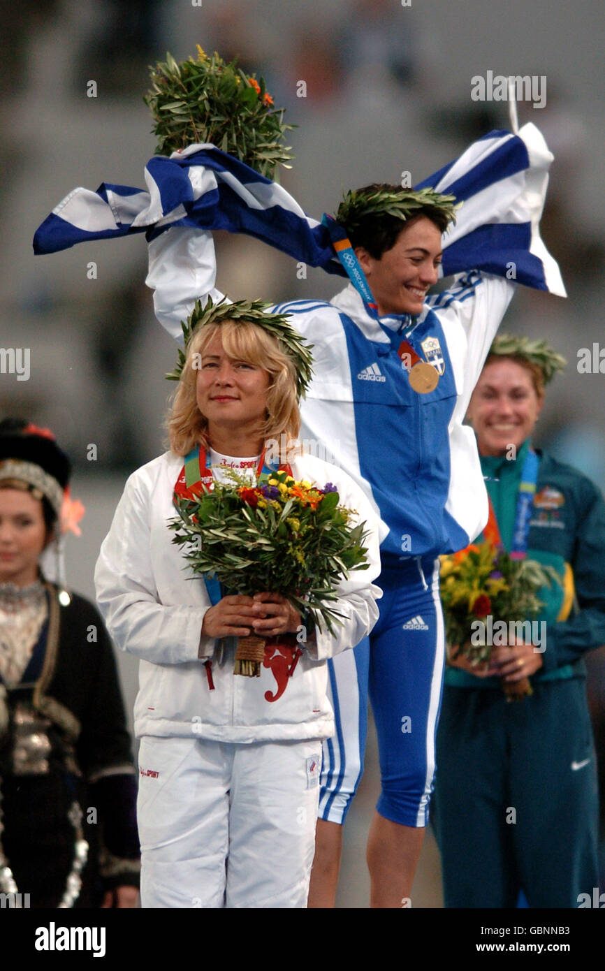 Athletics - Athens Olympic Games 2004 - Women's 20km Walk - Final. Greece's Athanasia Tsoumeleka celebrates receiving her gold medal at the ceremony Stock Photo