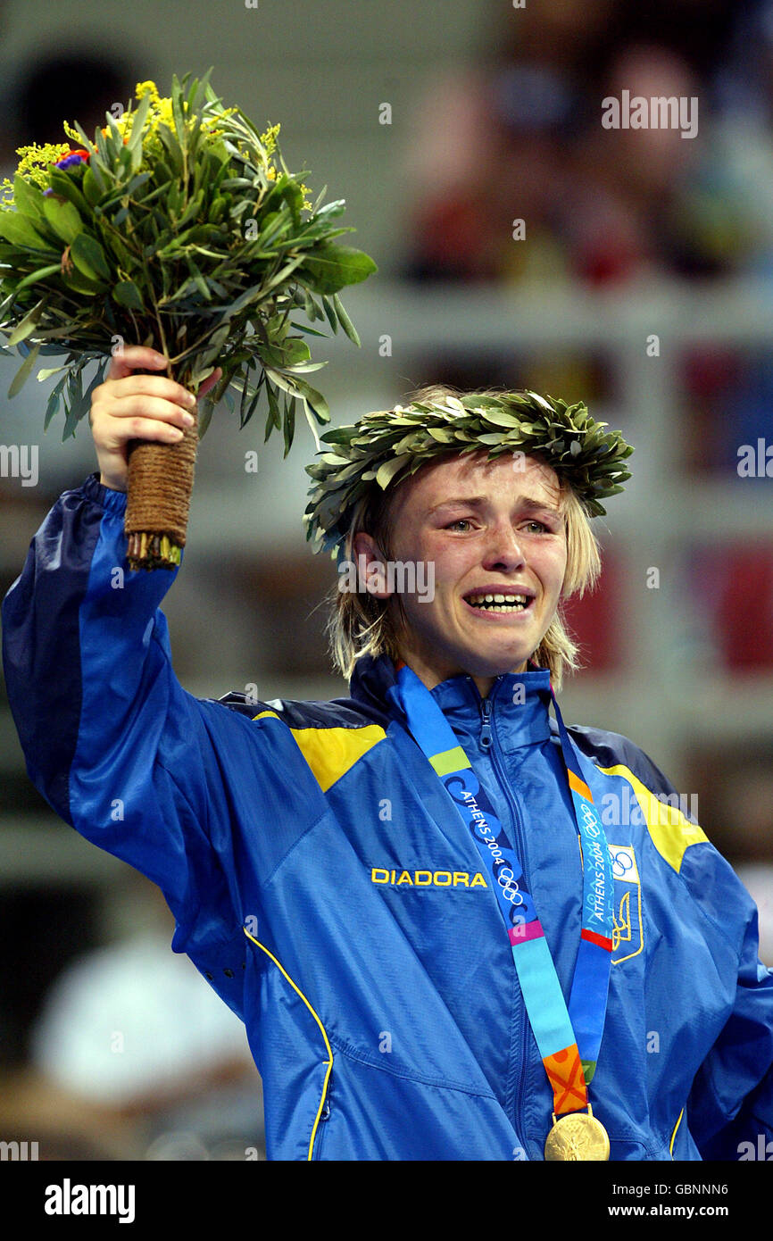 Ukraine's Irini Merleni is unable to control her emotions as she collects her gold medal Stock Photo