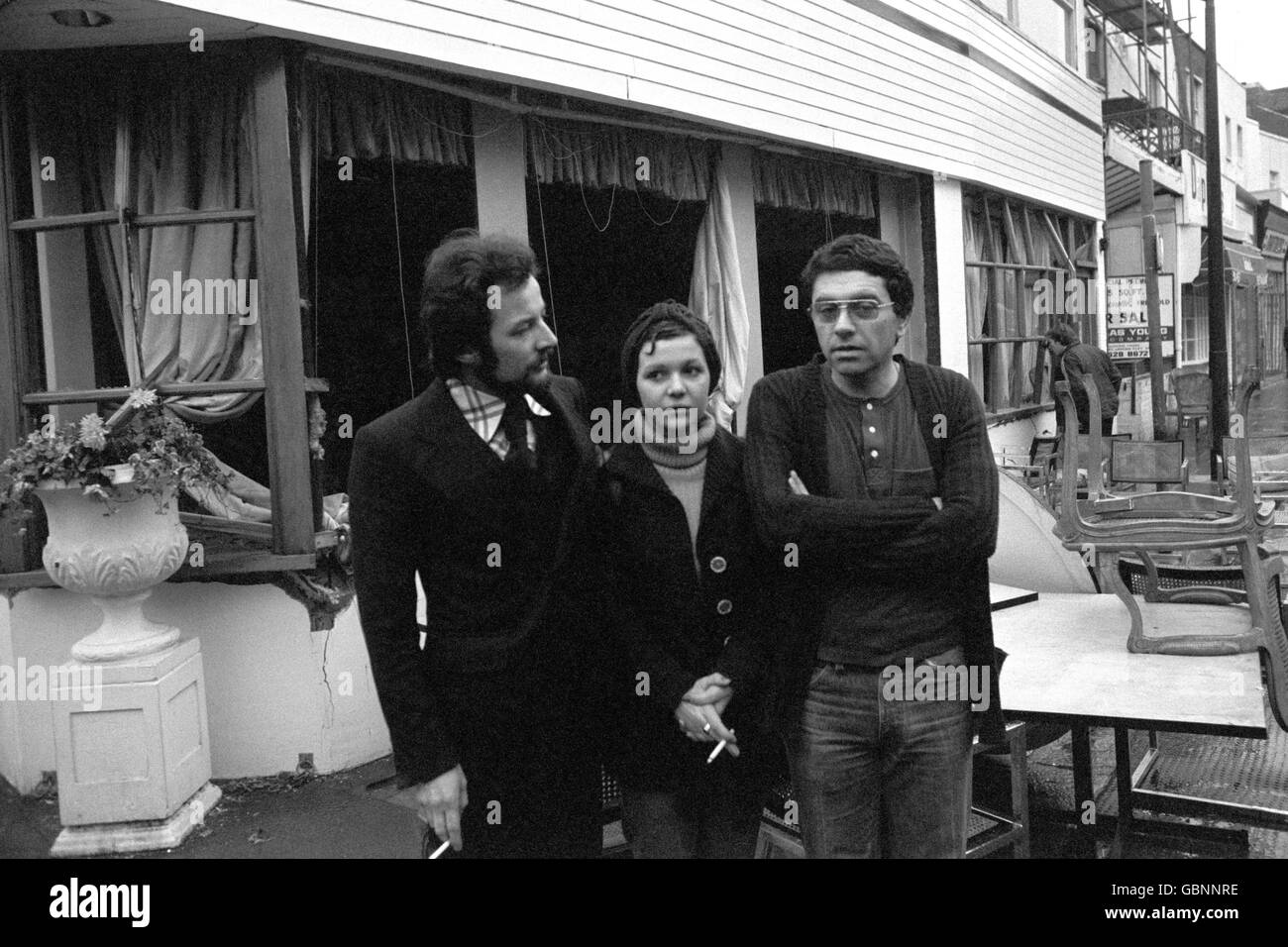 Manager Malcolm Livingston, left, assistant manageress Maryse Chirent, and chef Michael Osborn outside the wrecked Walton's Restaurant in Chelsea after an IRA bomb left two people dead and 17 injured. Stock Photo