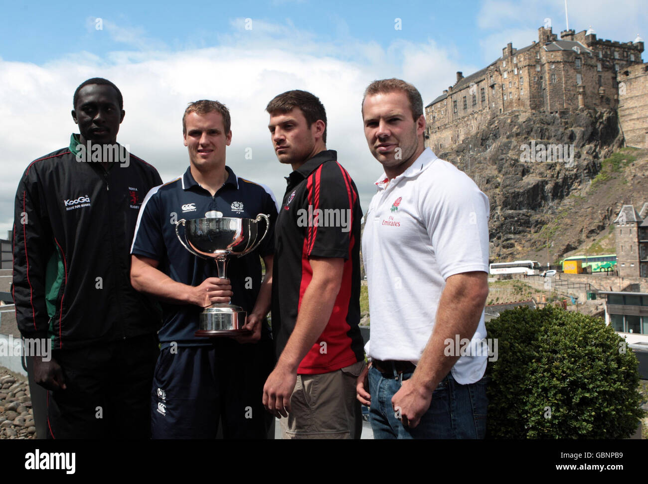 Team Captains; Kenya's Humphrey Kayange, Scotland's Scott Forrest, Canada's Neil Meecham and England's Ollie Phillips (left to right) pose with the 7s Cup Trophy during an Emirates Airline Edinburgh 7s Festival photocall in Edinburgh, Scotland. Stock Photo