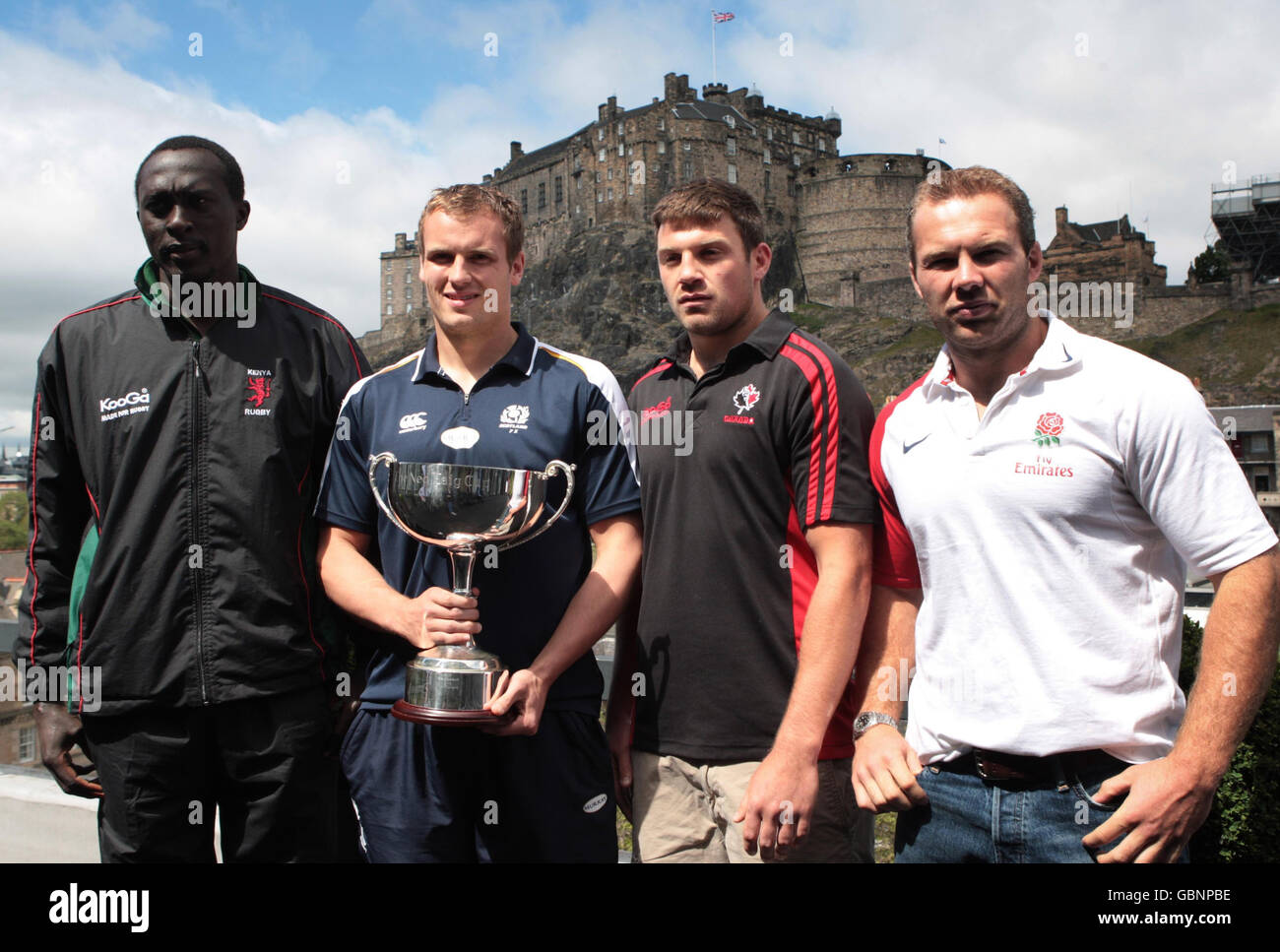 Team Captains; Kenya's Humphrey Kayange, Scotland's Scott Forrest, Canada's Neil Meecham and England's Ollie Phillips (left to right) pose with the 7s Cup Trophy during an Emirates Airline Edinburgh 7s Festival photocall in Edinburgh, Scotland. Stock Photo