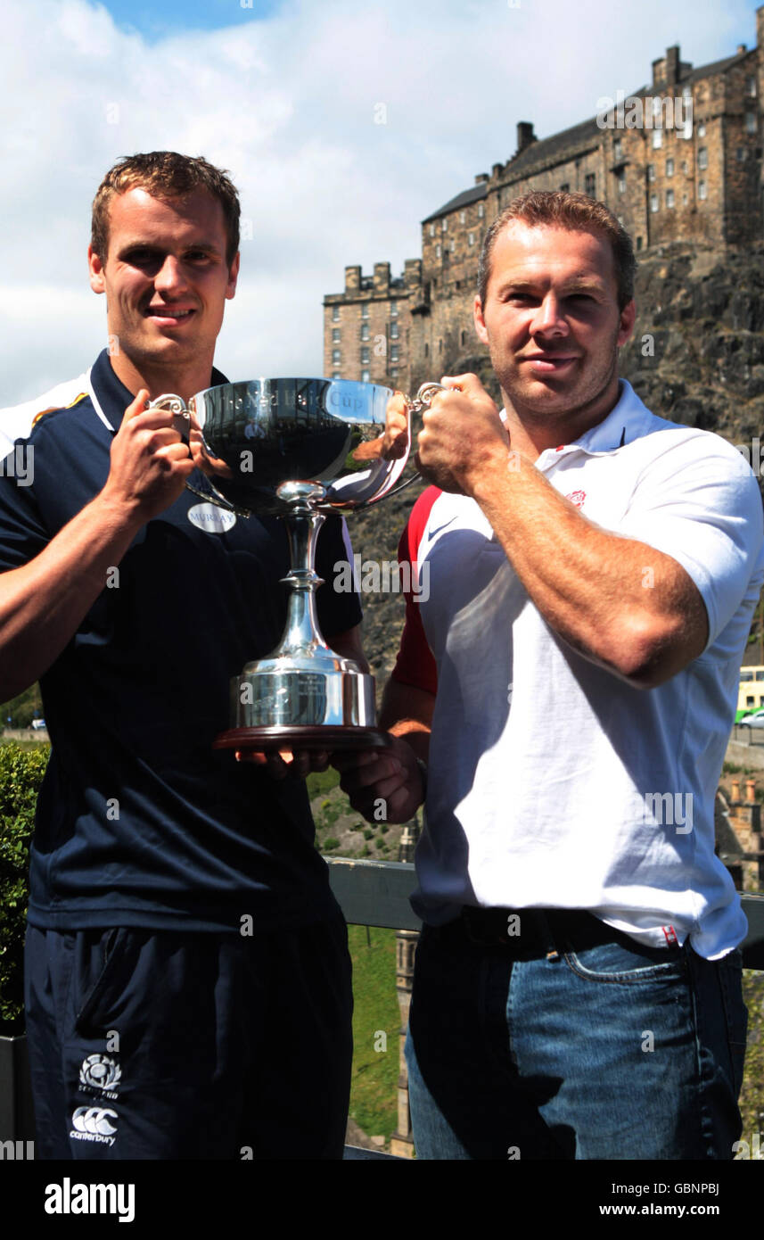 Team Captains; Scotland's Scott Forrest and England's Ollie Phillips (left to right) pose with the 7s Cup Trophy during an Emirates Airline Edinburgh 7s Festival photocall in Edinburgh, Scotland. Stock Photo