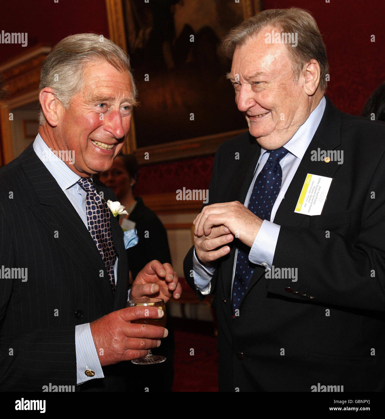 The Prince of Wales, left, Patron of the University of Cambridge Programme for Sustainability Leadership, talks with Professor Carlo Rubbia, the winner of the Nobel Prize in Physics in 1984, during a reception for Nobel Laureates and climate change experts at St James's Palace in London. Stock Photo