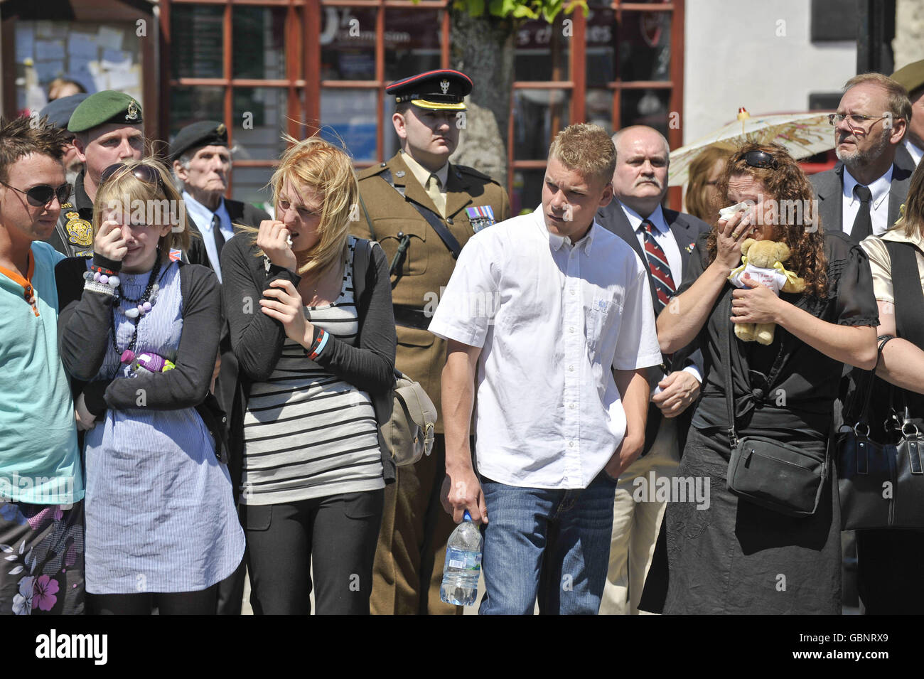 Mourners line the streets of Wootton Bassett as the body Lance Corporal