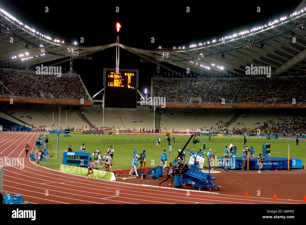 A general view of the Olympic Stadium, with the Olympic flame at one end Stock Photo