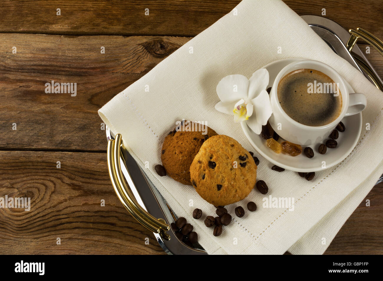 Romantic coffee served with white orchid. Coffee cup. Morning coffee