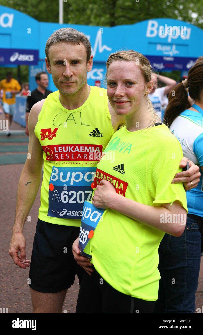 Scottish actor Cal Macaninch and his pregnant wife Shauna MacDonald, a Canadian television and film actress complete this morning's during the Bupa London 10,000 Run in London. Stock Photo