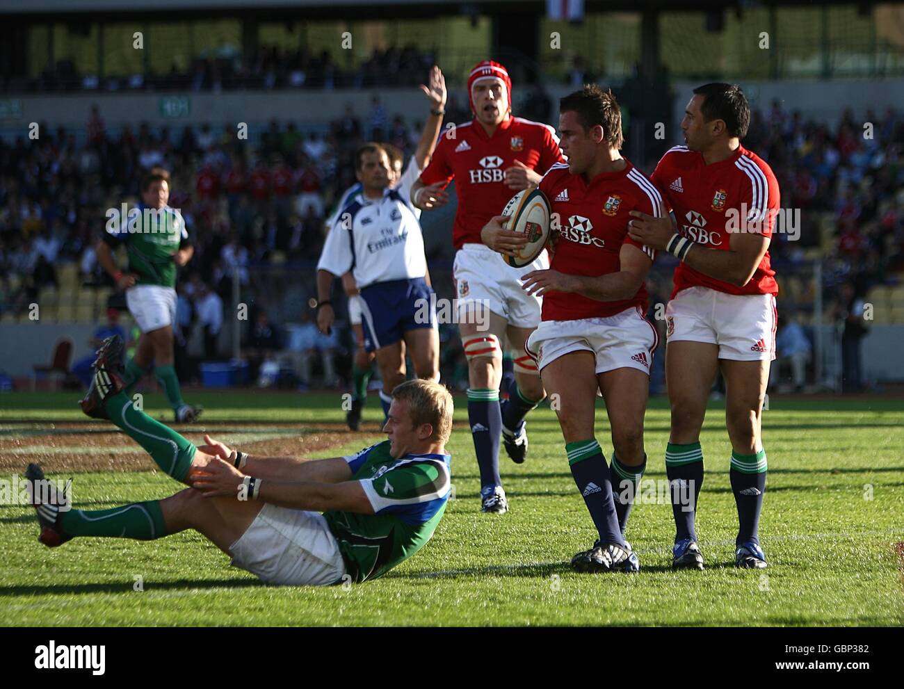 British and Irish Lions' Lee Byrne (2nd right) is congratulated by teammate Riki Flutey (right) after he scores their sides second try of the game Stock Photo