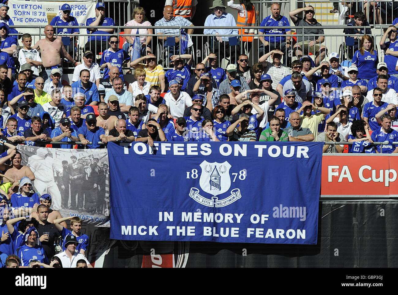 Everton fans watch in the stands hires stock photography and images