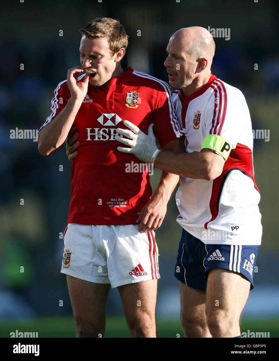 British and Irish Lions Mike Blair recieves treatment from Physiotherapist Phil Pask during the Tour match at Royal Bafokeng Sports Palace, Phokeng, South Africa. Stock Photo