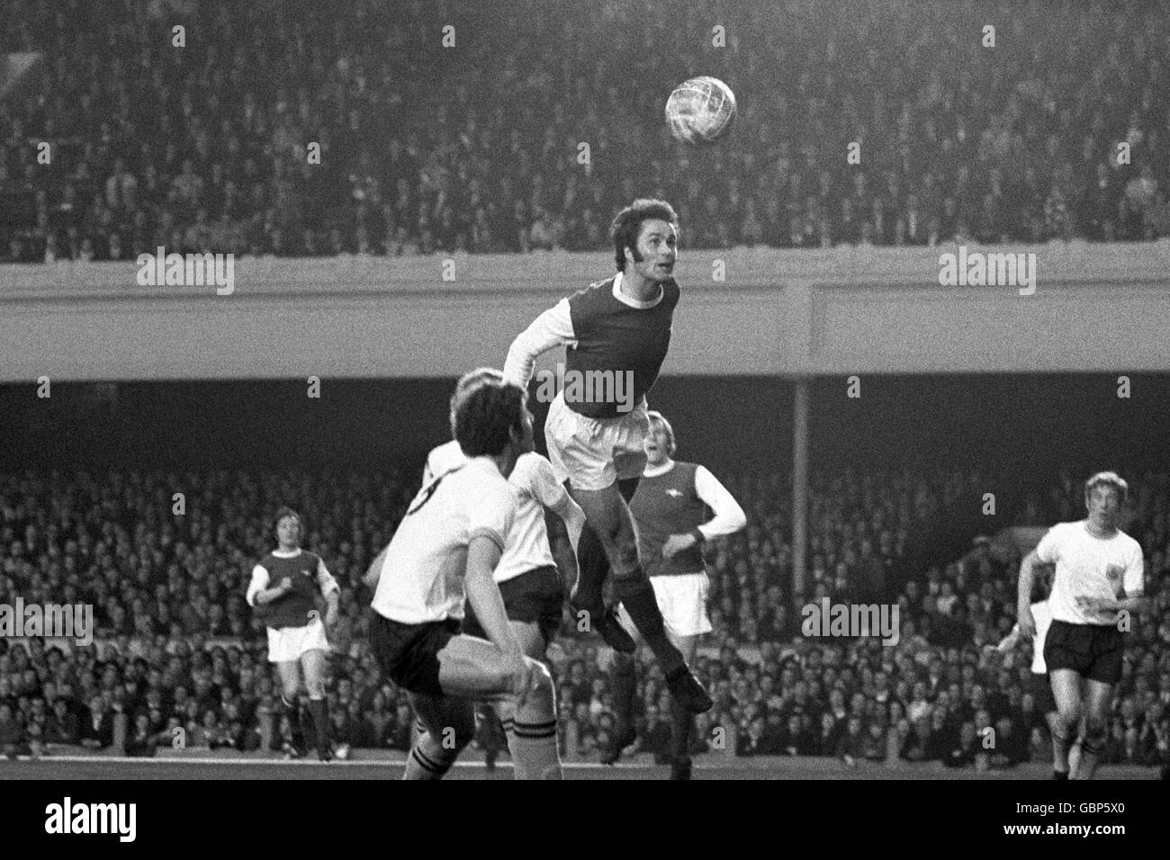 Soccer - League Division One - Arsenal v Burnley - Highbury. A head above the others was George Graham of Arsenal as he got up to the ball against Burnley Stock Photo