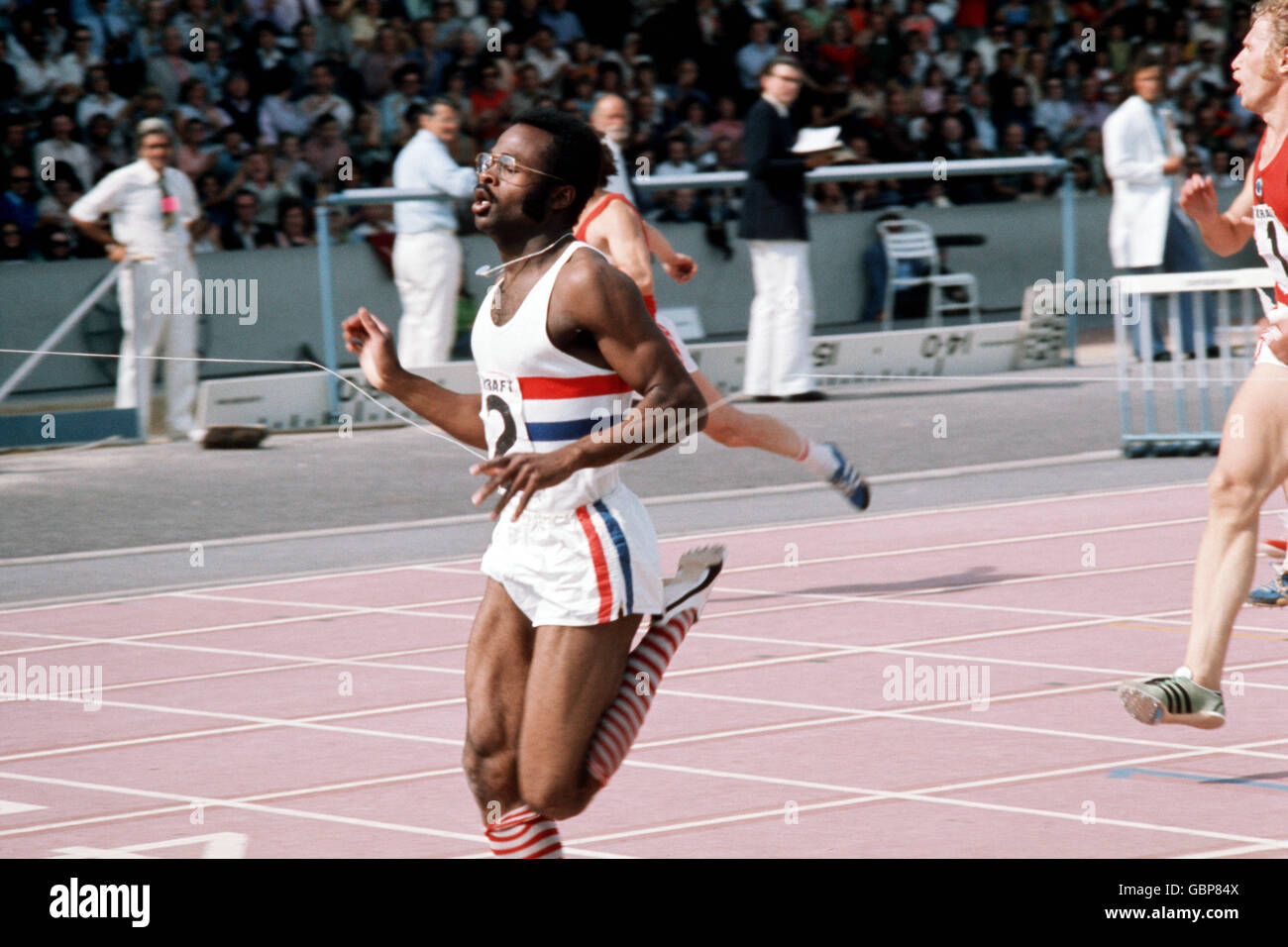 Athletics - Great Britain v USSR. Great Britain's Ainsley Bennett crosses the line to win the men's 200m Stock Photo