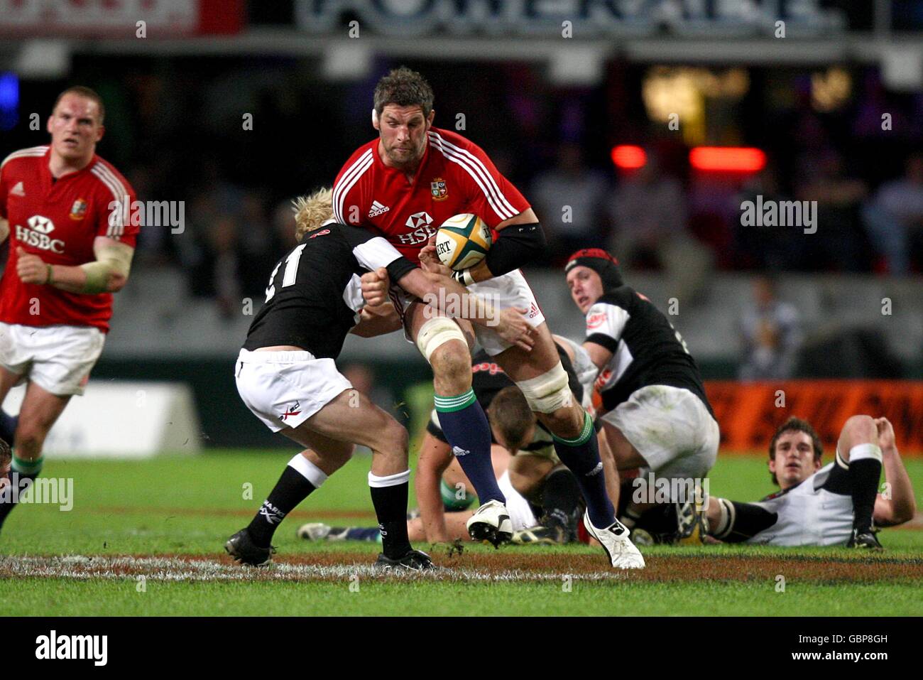 Rugby Union - Tour Match - Sharks v British and Irish Lions - ABSA Stadium. British and Irish Lions' Simon Shaw (centre) battles his way through the Sharks defence. Stock Photo