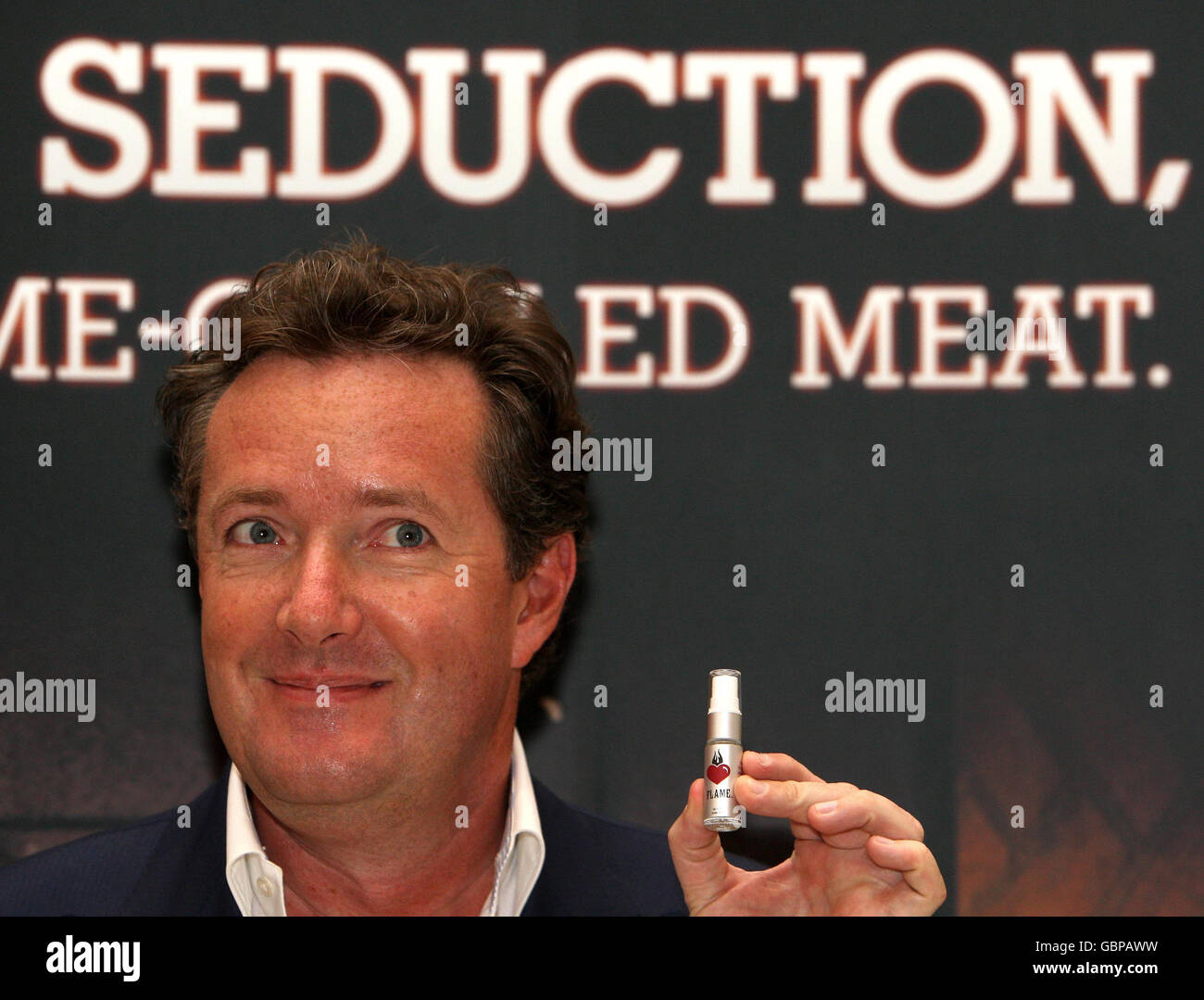 Piers Morgan at a photocall to launch the new Burger King 'Flame' fragrance, at Selfridges, in central London. Stock Photo