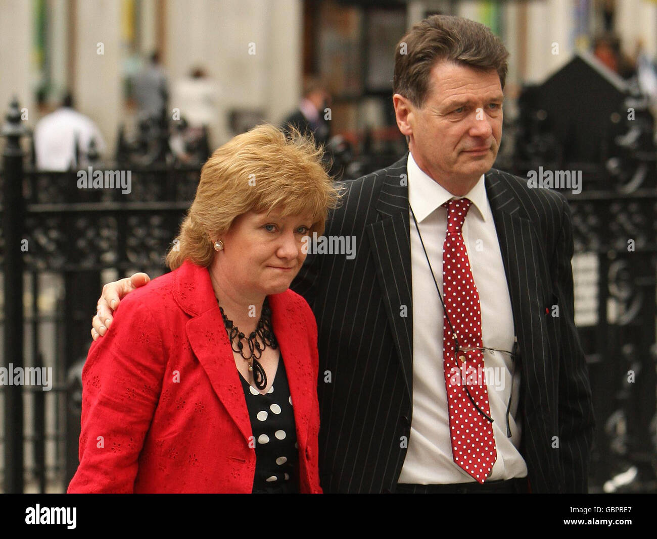 Former chief executive of Cheltenham local authority, Christine Laird and her husband Hugh Laird, outside the Royal Courts of Justice in central London where she succeeded in fighting a 1 million lawsuit brought against her by Cheltenham Borough Council for fraudulently or negligently withholding details of her history of depressive illness when she applied to become its managing director. Stock Photo