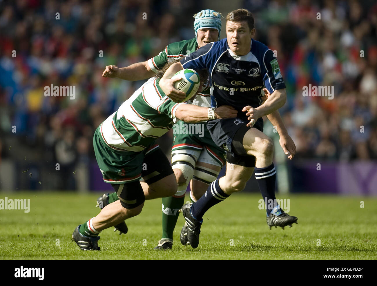 Leinster's Brian O'Driscoll is tackled by Leicester's Martin Castrogiovanni during the Heineken Cup Final at Murrayfield, Edinburgh. Stock Photo