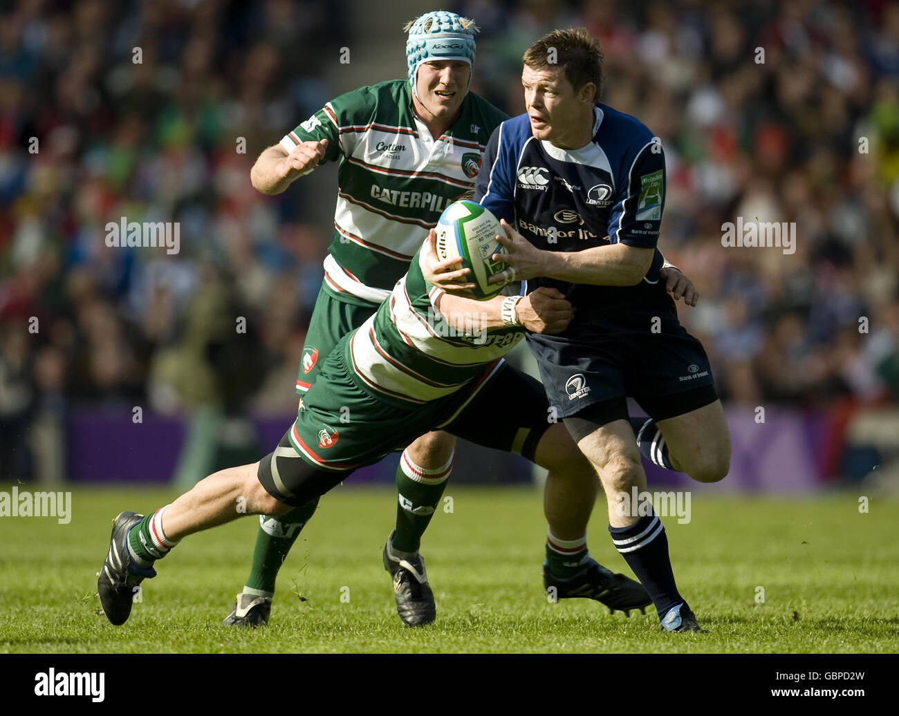 Leinster's Brian O'Driscoll is tackled by Leicester's Martin Castrogiovanni during the Heineken Cup Final at Murrayfield, Edinburgh. Stock Photo