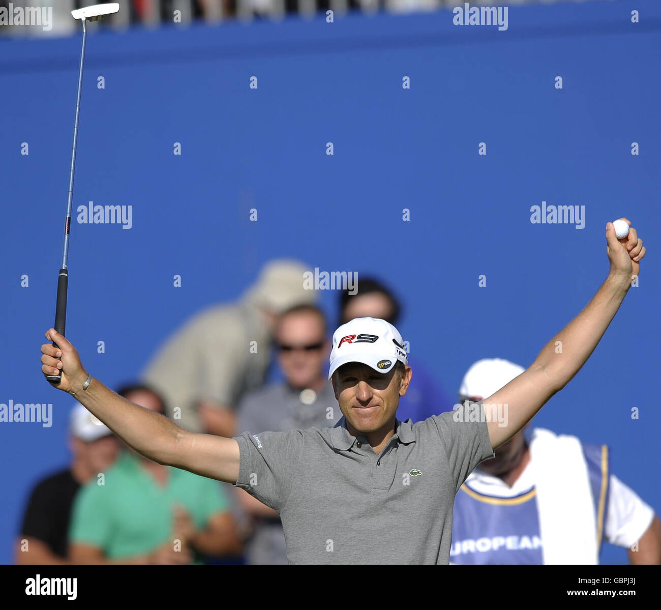 France's Christian Cevaer celebrates on the final green after winning